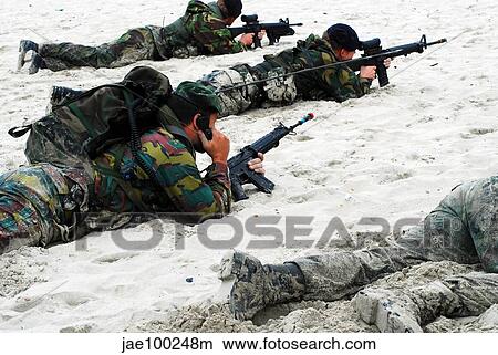 Picture - Dutch Royal Marines taking part in Operation Storm Tide.. Fotosearch