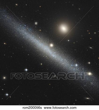 Stock Photograph - Dwarf galaxy UGC 1281 in the Triangulum constellation.. Fotosearch