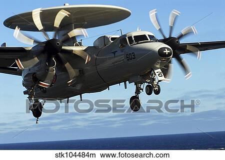 E-2C Hawkeye approaches the flight deck of USS John C Stennis. View Large Photo Image Picture - E-2C Hawkeye approaches the flight deck of USS John C Stennis.. Fotosearch