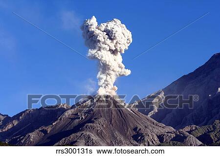 Stock Photograph - Eruption of ash cloud from Santiaguito dome complex, Santa Maria volcano, Guatemala.. Fotosearch