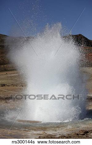 Stock Photograph - Eruption of Strokkur Geysir, Iceland.. Fotosearch