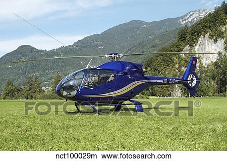 Eurocopter EC130 light utility helicopter. View Large Photo Image Picture - Eurocopter EC130 light utility helicopter.. Fotosearch