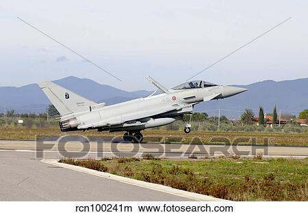 Eurofighter EF2000 Typhoon from the Italian Air Force landing at Grosseto Air Base. View Large Photo Image Picture - Eurofighter EF2000 Typhoon from the Italian Air Force landing at Grosseto Air Base.. Fotosearch