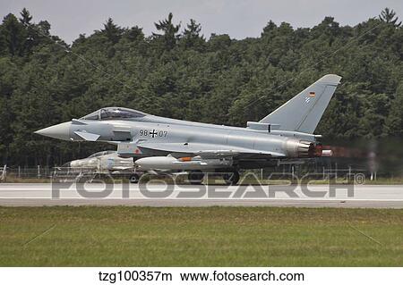 Eurofighter Typhoon of the German Air Force taking off. View Large Photo Image Picture - Eurofighter Typhoon of the German Air Force taking off.. Fotosearch