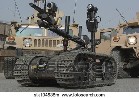 Explosive Ordnance Disposal robot used to safely inspect unsafe situations. View Large Photo Image Picture - Explosive Ordnance Disposal robot used to safely inspect unsafe situations.. Fotosearch