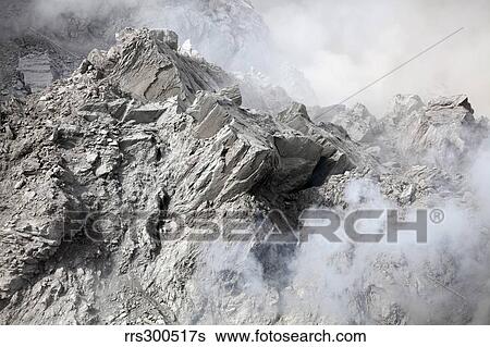 Stock Photograph - Extrusion lobe on Rerombola lava dome of Paluweh volcano.. Fotosearch