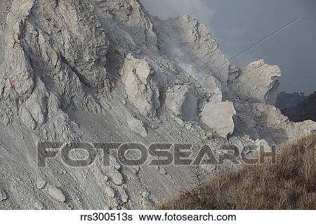 Stock Photograph - Extrusion lobes on flank of Rerombola lava dome of Paluweh volcano.. Fotosearch
