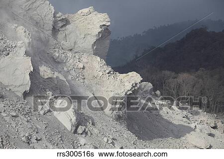 Stock Photograph - Extrusion lobes on flank of Rerombola lava dome of Paluweh volcano.. Fotosearch
