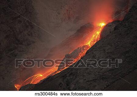 Extrusion of lava on glowing rockfalls. Batu Tara volcano, Indonesia. View Large Photo Image Stock Photograph - Extrusion of lava on glowing rockfalls. Batu Tara volcano, Indonesia.. Fotosearch