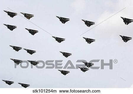 F-14D Tomcats conduct a flyover of Naval Air Station Oceana airfield. View Large Photo Image Picture - F-14D Tomcats conduct a flyover of Naval Air Station Oceana airfield.. Fotosearch
