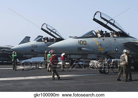 F-14D Tomcats on the flight deck of USS Theodore Roosevelt. View Large Photo Image Picture - F-14D Tomcats on the flight deck of USS Theodore Roosevelt.. Fotosearch