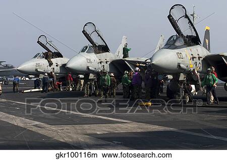 F-14D Tomcats on the flight deck of USS Theodore Roosevelt. View Large Photo Image Picture - F-14D Tomcats on the flight deck of USS Theodore Roosevelt.. Fotosearch