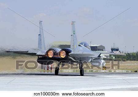 F-15 Eagle of the Royal Saudi Air Force taking off. View Large Photo Image Picture - F-15 Eagle of the Royal Saudi Air Force taking off.. Fotosearch
