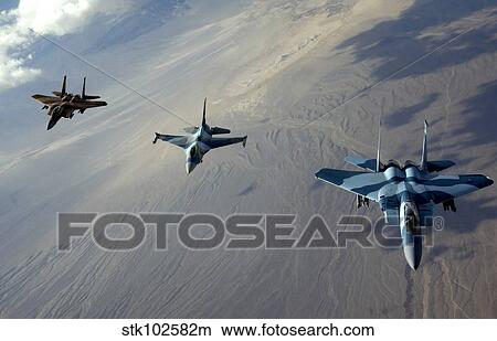 F-15 Eagles and a F-16 Fighting Falcon fly in formation. View Large Photo Image Picture - F-15 Eagles and a F-16 Fighting Falcon fly in formation.. Fotosearch