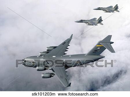 F-15B Eagles escort the first Hawaii-based C-17 Globemaster III to its home. View Large Photo Image Picture - F-15B Eagles escort the first Hawaii-based C-17 Globemaster III to its home.. Fotosearch