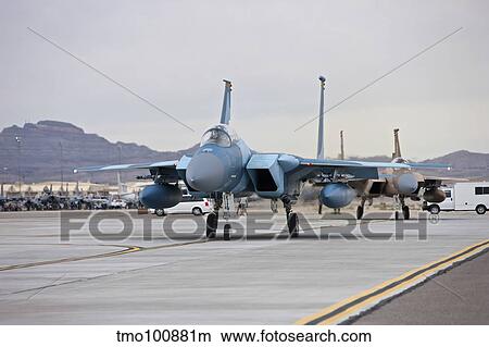 F-15C Eagles taxi to the runway at Nellis Air Force Base, Nevada. View Large Photo Image Picture - F-15C Eagles taxi to the runway at Nellis Air Force Base, Nevada.. Fotosearch