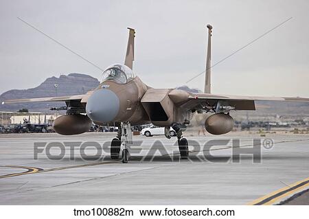 F-15C Eagles taxi to the runway at Nellis Air Force Base, Nevada. View Large Photo Image Picture - F-15C Eagles taxi to the runway at Nellis Air Force Base, Nevada.. Fotosearch
