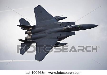 F-15E Strike Eagle low flying over North Wales. View Large Photo Image Picture - F-15E Strike Eagle low flying over North Wales.. Fotosearch