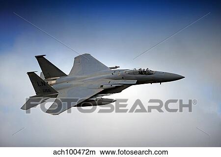 F-15E Strike Eagle low flying over North Wales. View Large Photo Image Picture - F-15E Strike Eagle low flying over North Wales.. Fotosearch