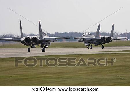 F-15E Strike Eagles of the U. S. Air Force line up for takeoff. View Large Photo Image Picture - F-15E Strike Eagles of the U. S. Air Force line up for takeoff.. Fotosearch