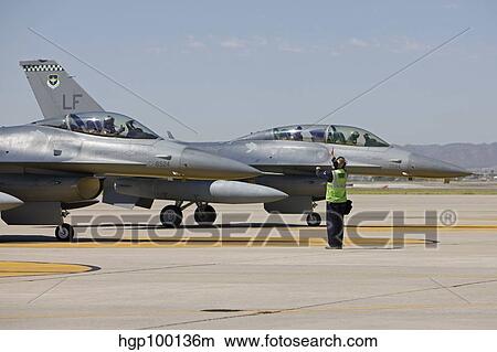 stock photo of f 16 pilots work with crew chiefs on preflight checks crew chief air force