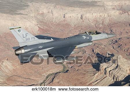 F-16C Fighting Falcon flying over the Grand Canyon, Arizona. View Large Photo Image Picture - F-16C Fighting Falcon flying over the Grand Canyon, Arizona.. Fotosearch