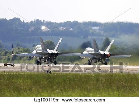 F-18C Hornets of the Swiss Air Force, Neuburg Airfield, Germany. View Large Photo Image Picture - F-18C Hornets of the Swiss Air Force, Neuburg Airfield, Germany.. Fotosearch