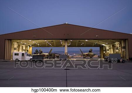 F-22 Raptor's parked in the hangar at Holloman Air Force Base. View Large Photo Image Picture - F-22 Raptor's parked in the hangar at Holloman Air Force Base.. Fotosearch
