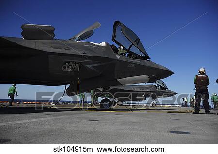 F-35B Lightning II variants are secured on the flight deck of USS Wasp. View Large Photo Image Picture - F-35B Lightning II variants are secured on the flight deck of USS Wasp.. Fotosearch