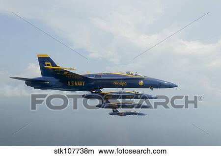 F/A-18 Hornets from the U. S. Navy Blue Angels team. View Large Photo Image Picture - F/A-18 Hornets from the U. S. Navy Blue Angels team.. Fotosearch