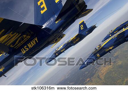 F/A-18 Hornets of the Blue Angels fly in formation over Colorado. View Large Photo Image Picture - F/A-18 Hornets of the Blue Angels fly in formation over Colorado.. Fotosearch