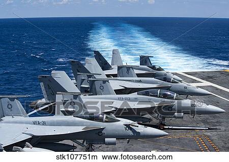 F/A-18 Super Hornets on the flight deck of USS George H. W. Bush. View Large Photo Image Picture - F/A-18 Super Hornets on the flight deck of USS George H. W. Bush.. Fotosearch