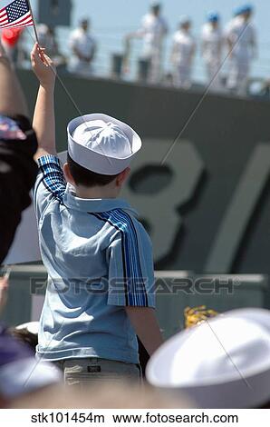 Family members welcome home the Sailors aboard USS WInston S. Churchill. View Large Photo Image Picture - Family members welcome home the Sailors aboard USS WInston S. Churchill.. Fotosearch