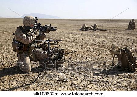 Field radio operator provides security during a mission in Afghanistan. View Large Photo Image Picture - Field radio operator provides security during a mission in Afghanistan.. Fotosearch