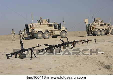 Firearms sit ready on a firing range in Kunduz, Afghanistan. View Large Photo Image Picture - Firearms sit ready on a firing range in Kunduz, Afghanistan.. Fotosearch