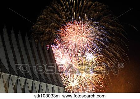 Picture - Fireworks explode over the Air Force Academy Cadet Chapel.. Fotosearch