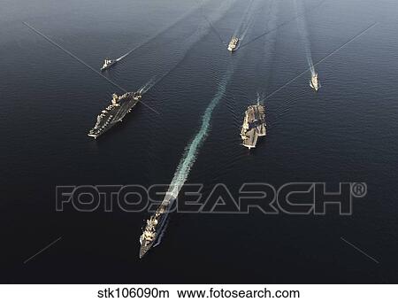 Fleet of Navy ships transit the Arabian Sea. View Large Photo Image Picture - Fleet of Navy ships transit the Arabian Sea.. Fotosearch