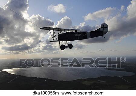Fokker D. VII World War I replica fighter in the air. View Large Photo Image Picture - Fokker D. VII World War I replica fighter in the air.. Fotosearch