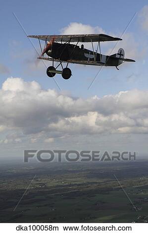 Fokker D. VII World War I replica fighter in the air. View Large Photo Image Picture - Fokker D. VII World War I replica fighter in the air.. Fotosearch