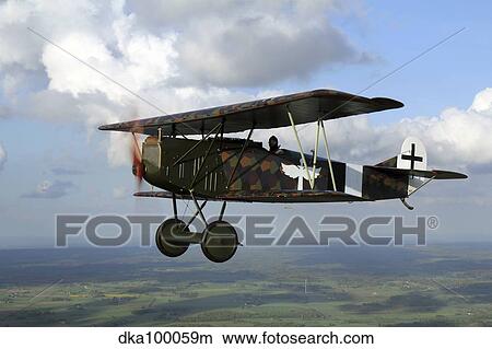 Picture - Fokker D. VII World War I replica fighter in the air.. Fotosearch