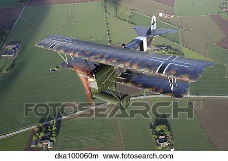 Fokker D. VII World War I replica fighter in the air. View Large Photo Image Picture - Fokker D. VII World War I replica fighter in the air.. Fotosearch