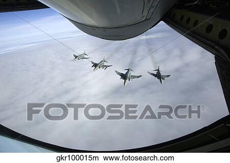 Formation of Luftwaffe F-4F Phantom II's behind a tanker. View Large Photo Image Picture - Formation of Luftwaffe F-4F Phantom II's behind a tanker.. Fotosearch