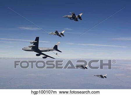 Four F-16's and a KC-135 fly in formation over Arizona. View Large Photo Image Picture - Four F-16's and a KC-135 fly in formation over Arizona.. Fotosearch