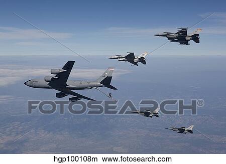 Four F-16's and a KC-135 fly in formation over Arizona. View Large Photo Image Picture - Four F-16's and a KC-135 fly in formation over Arizona.. Fotosearch
