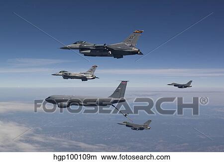 Picture - Four F-16's and a KC-135 fly in formation over Arizona.. Fotosearch