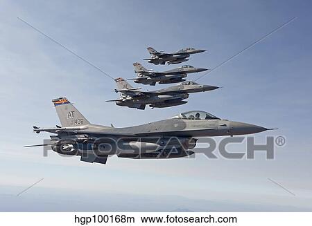 Four F-16's fly in formation over Arizona. View Large Photo Image Picture - Four F-16's fly in formation over Arizona.. Fotosearch