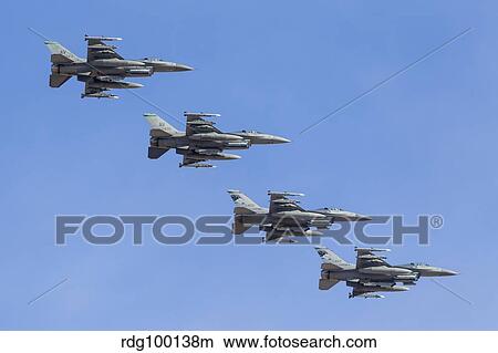 Picture - Four U. S. Air Force F-16C Fighting Falcons in echelon formation.. Fotosearch