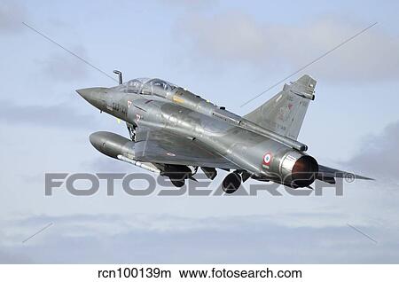 French Air Force Mirage 2000D taking off with full afterburner. View Large Photo Image Picture - French Air Force Mirage 2000D taking off with full afterburner.. Fotosearch