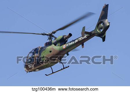 French Army Gazelle helicopter in flight over France. View Large Photo Image Picture - French Army Gazelle helicopter in flight over France.. Fotosearch