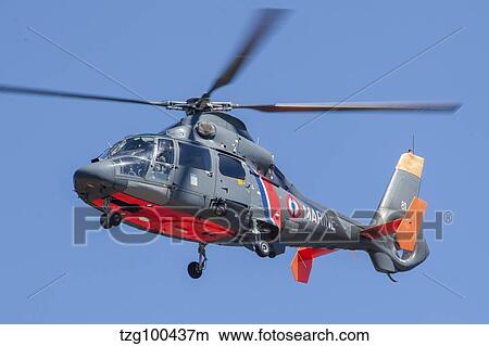 French Navy AS365 Dauphin helicopter in flight over France. View Large Photo Image Picture - French Navy AS365 Dauphin helicopter in flight over France.. Fotosearch